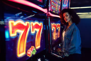 A cheerful woman in traditional clothing using her smartphone during a festive moment, showing how easily the BG44 app fits into everyday life.